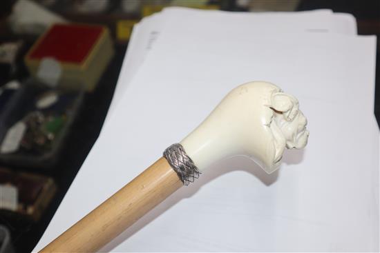 A carved ivory bulldog handled walking stick